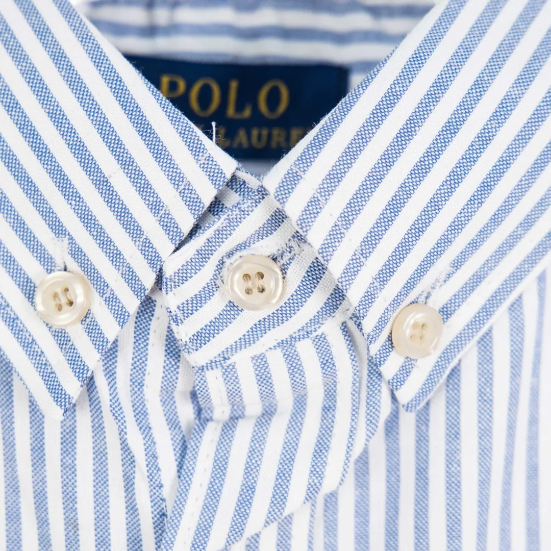 P250 zp version [Exclusive supply] Ralph Lauren/Ralph Lauren classic colorful small label striped casual shirt 1️⃣Made of high-quality classic striped fabric, the upper body is soft and comfortable, extremely delicate, has a solid, smooth and soft hand feel, and the fabric does not wrinkle, and the hand feel is invincible. The details are handled perfectly! 2️⃣Adopting the washing process, the workmanship details are perfectly controlled. They are all hemmed with vest technology, and the insides of the sleeves are also used. Different from the four-needle and five-thread workmanship, the collars are also all designed with interlining, showing high-end fashion and individuality, and the style is fashionable, simple and elegant! 3️⃣It is very youthful and energetic, and can be easily worn by both men and women. It is very in line with the fashion aesthetic concepts of today's young people!  Color: Striped Blue Size: S M L XL Number: SG10488